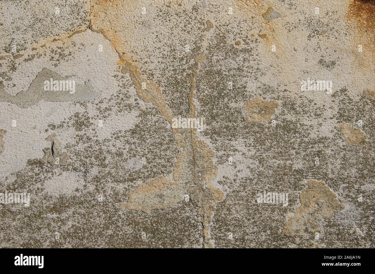 Mur de plâtre de fond, la texture. Mur fissuré dans le stuc Banque D'Images