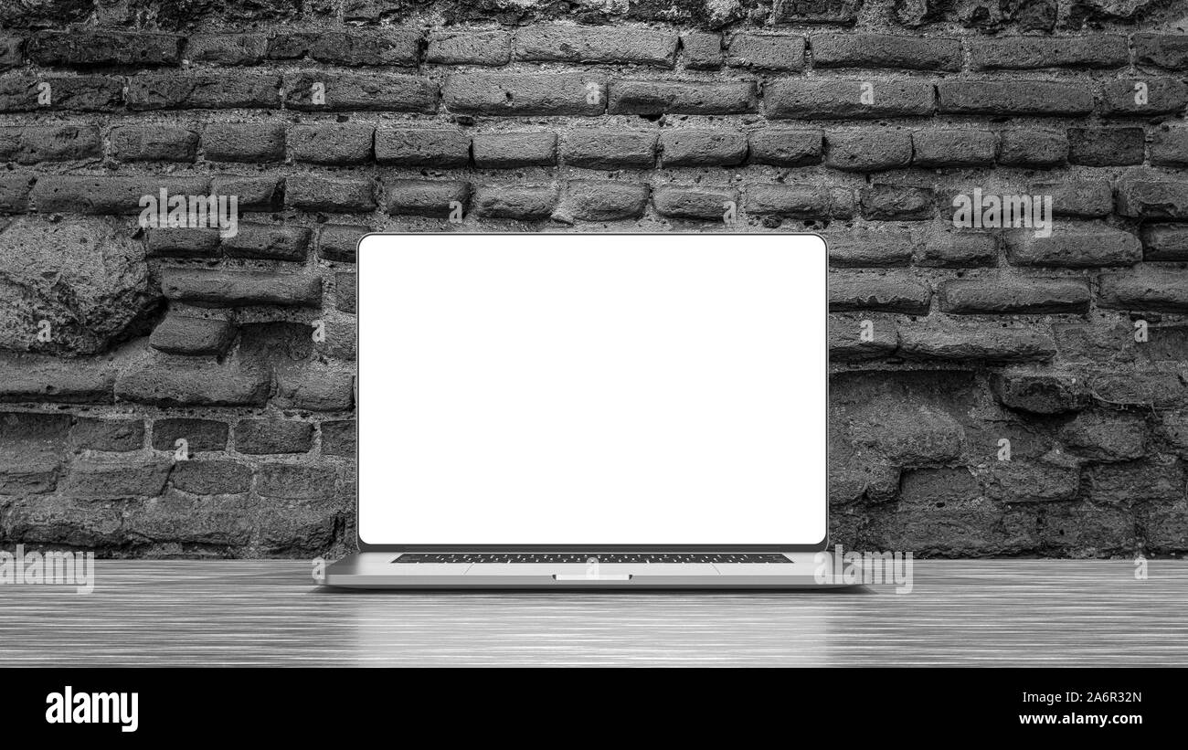 Modèle portable isolé sur fond brique. Immersive, design. Banque D'Images