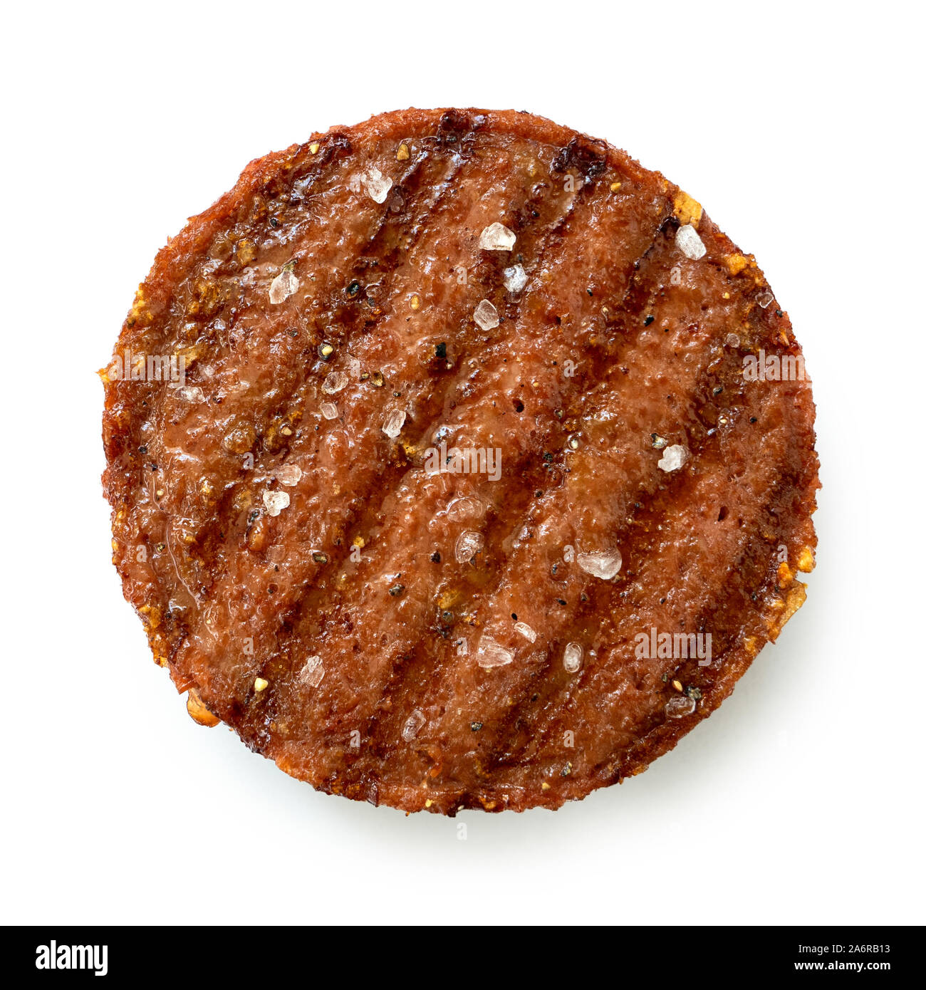 En fonction de l'usine patty hamburger grillé avec grill et marques de sel de roche isolé sur blanc. Vue d'en haut. Banque D'Images