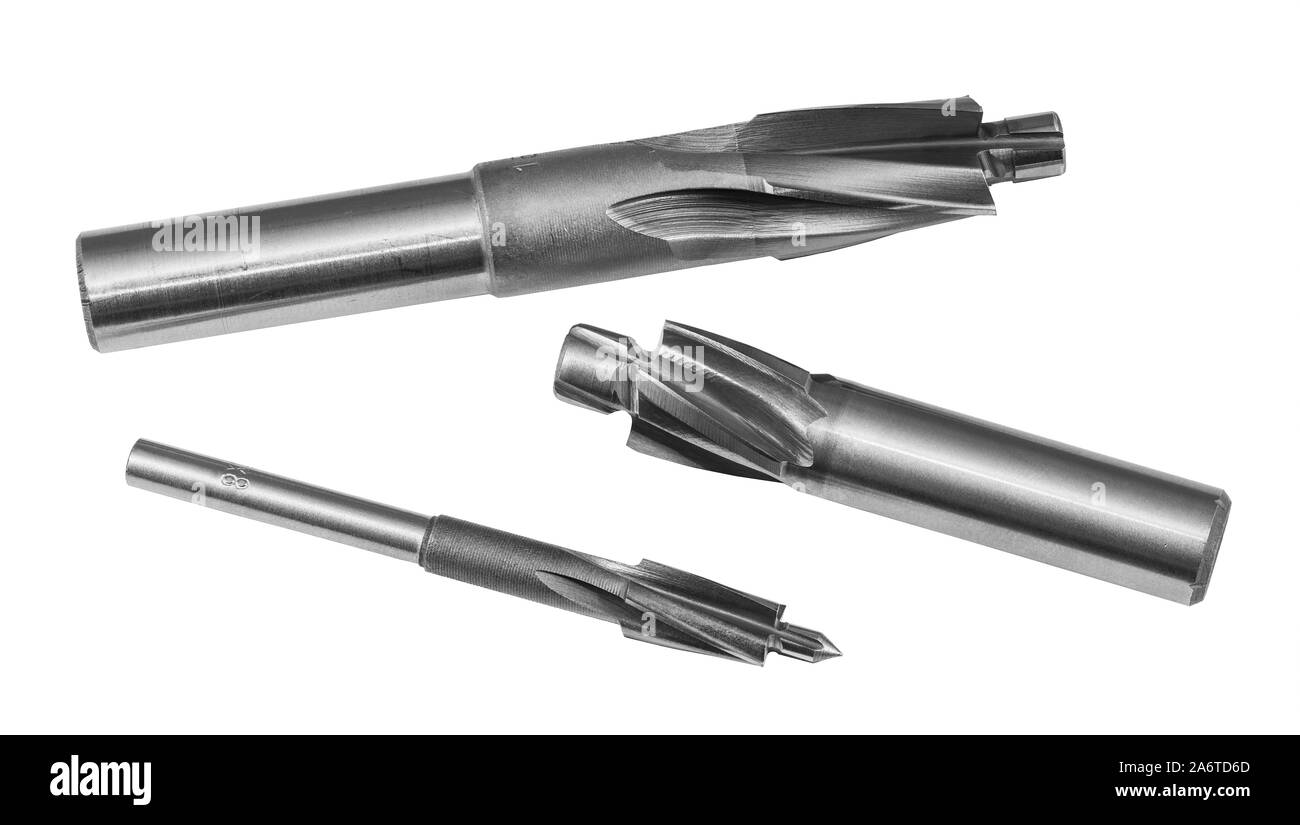 Trois fraise cylindrique en acier. Outils de coupe tranchants fixés pour le forage de trous. coaxial contre-alésé Détail de plissé en spirale. L'usinage de puce. Banque D'Images