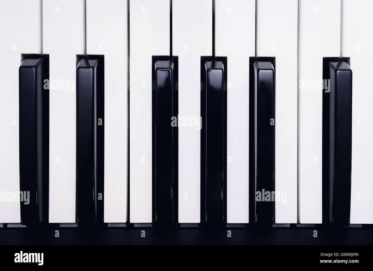 Piano ou synthétiseur électronique (clavier de piano) contexte clavier midi et le contrôleur avec les curseurs et boutons. Concept de fermer texture pattern mus Banque D'Images