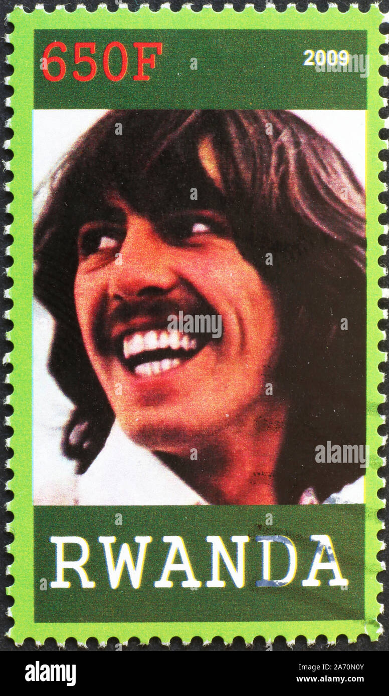 George Harrison sur timbre-poste du Rwanda Banque D'Images