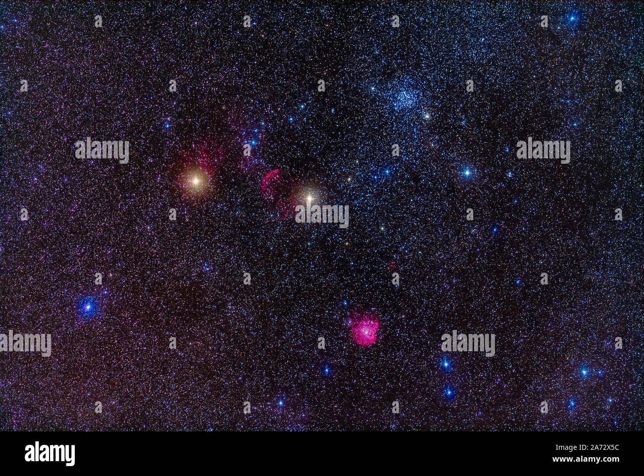 Le domaine de grappes et de nébulosités en Gémeaux, avec Messier 35 les principaux amas ouverts ici. Ci-dessous M38 est NGC 2158. La nébulosité à gauche entre Banque D'Images