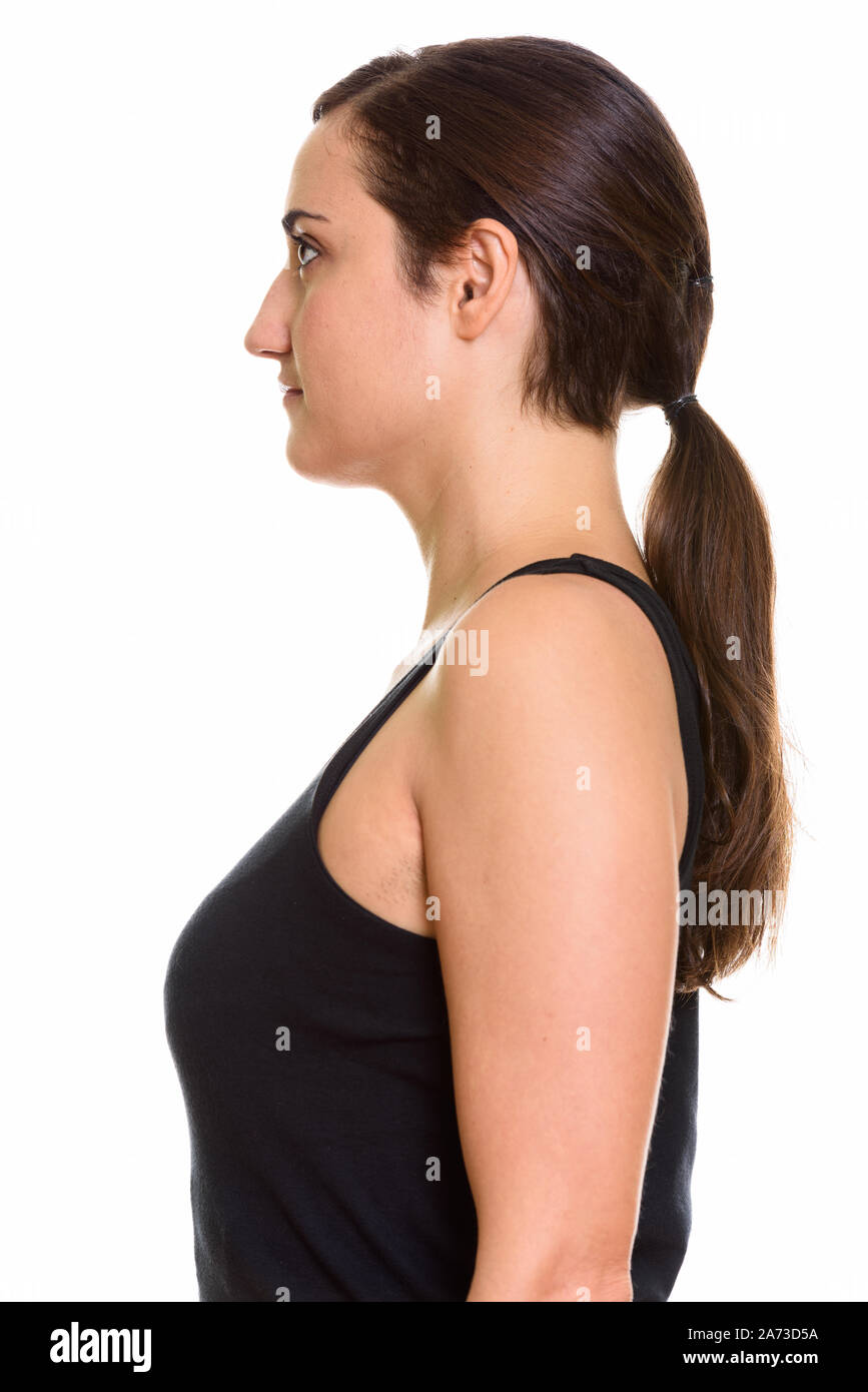 Le profil Voir les gros plan de belle jeune femme avec cheveux attachés Banque D'Images