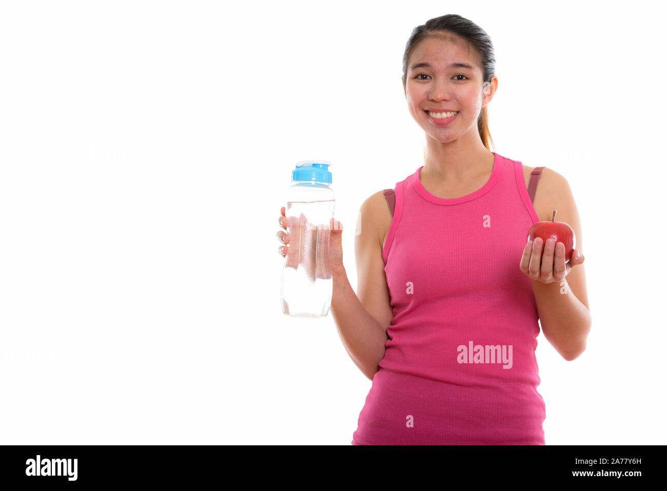 Studio shot of young Asian woman prêt pour salle de sport Banque D'Images