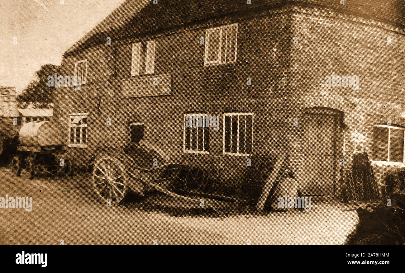 Vintage photographie prise à St George Osbourne, Wiltshire, Angleterre, des locaux de A. J. Sheppard et fils wheelwright, menuisier et le général Smith Banque D'Images