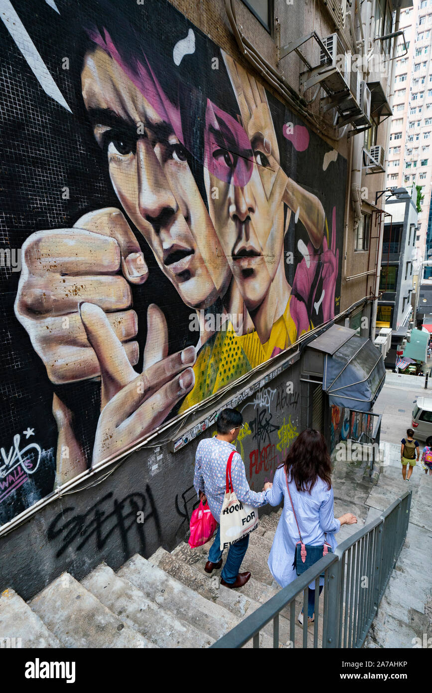 Street art de Bruce Lee par Xeva sur le mur au niveau du réservoir Lane à Sheung Wan Hong Kong, Chine Banque D'Images