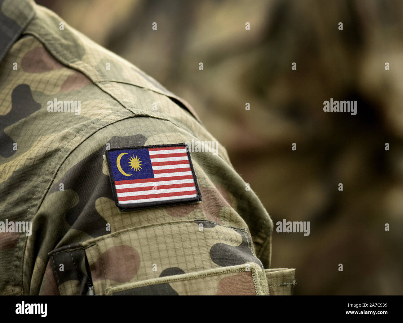 Drapeau de la Malaisie sur l'uniforme militaire. Les troupes de l'armée, soldats,. Collage. Banque D'Images