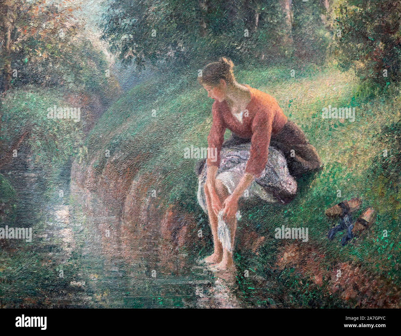 Woman Bathing ses pieds dans un ruisseau de Camille Pissarro (1830-1903), huile sur toile, 1894/5 Banque D'Images