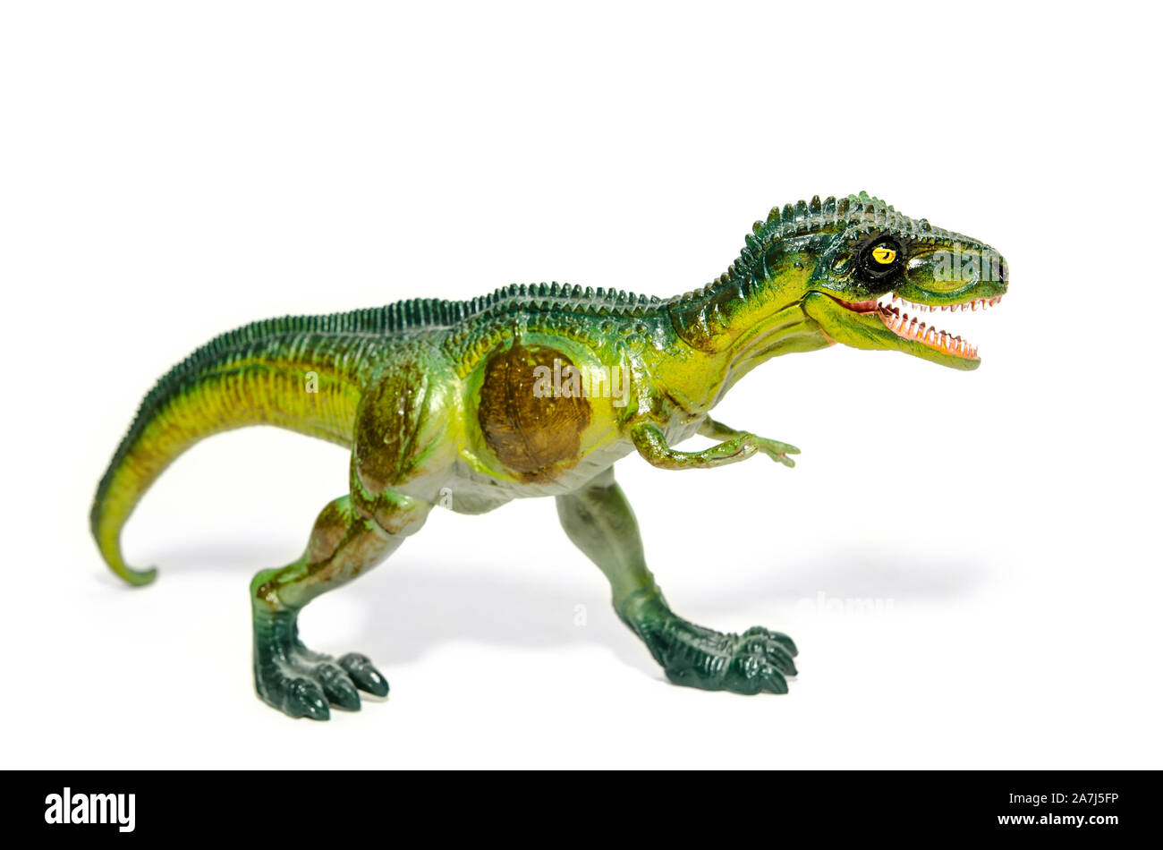 Dinosaure en plastique isolé sur fond blanc Banque D'Images
