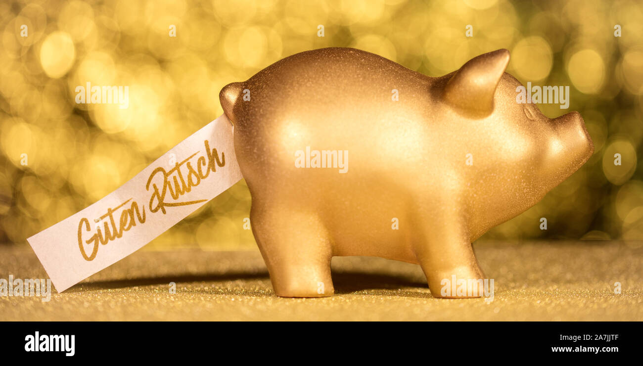 Panorama avec un cochon d'or avec texte allemand, ce qui signifie bonne année Banque D'Images