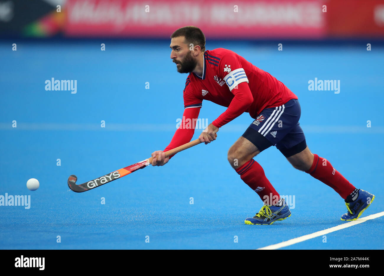 Adam Dixon, en Grande-Bretagne, lors du tournoi de qualification olympique de hockey de la FIH au Lee Valley Hockey and tennis Centre, Londres. Banque D'Images