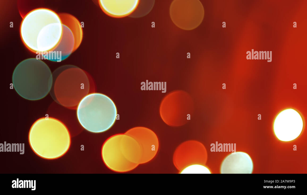 Résumé rouge floue lumières fond Noël lumineux Banque D'Images