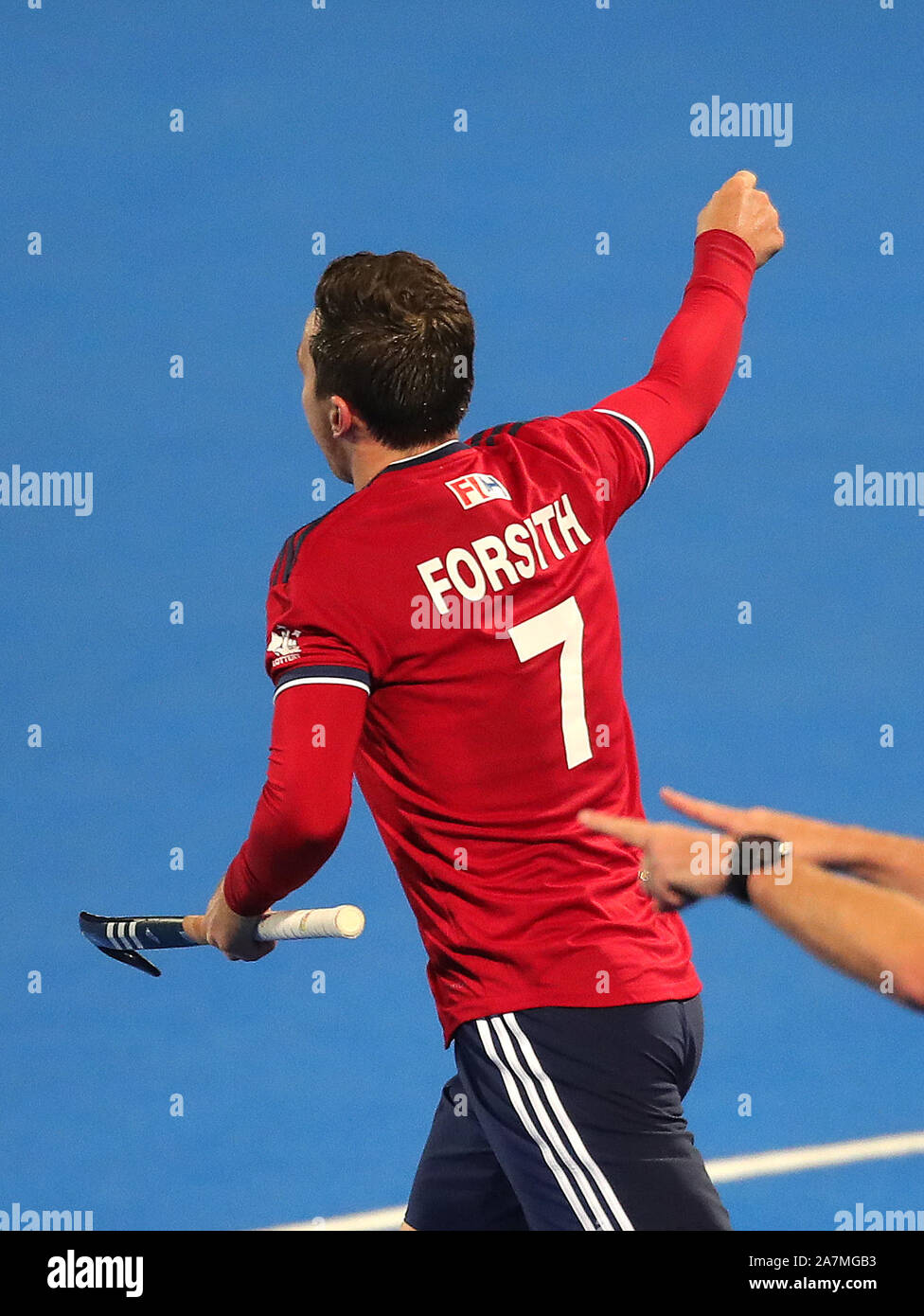 Alan Forsyth, en Grande-Bretagne, célèbre son troisième but du match lors du tournoi de qualification olympique de hockey FIH au Lee Valley Hockey and tennis Centre, Londres. Banque D'Images
