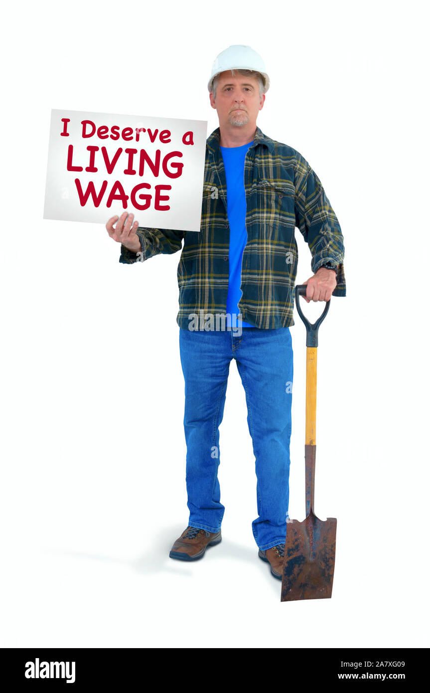 Blue Collar Worker homme dans un casque blanc avec pelle faisant le travail  manuel avec une pancarte disant que je mérite un salaire mal à sta Photo  Stock - Alamy