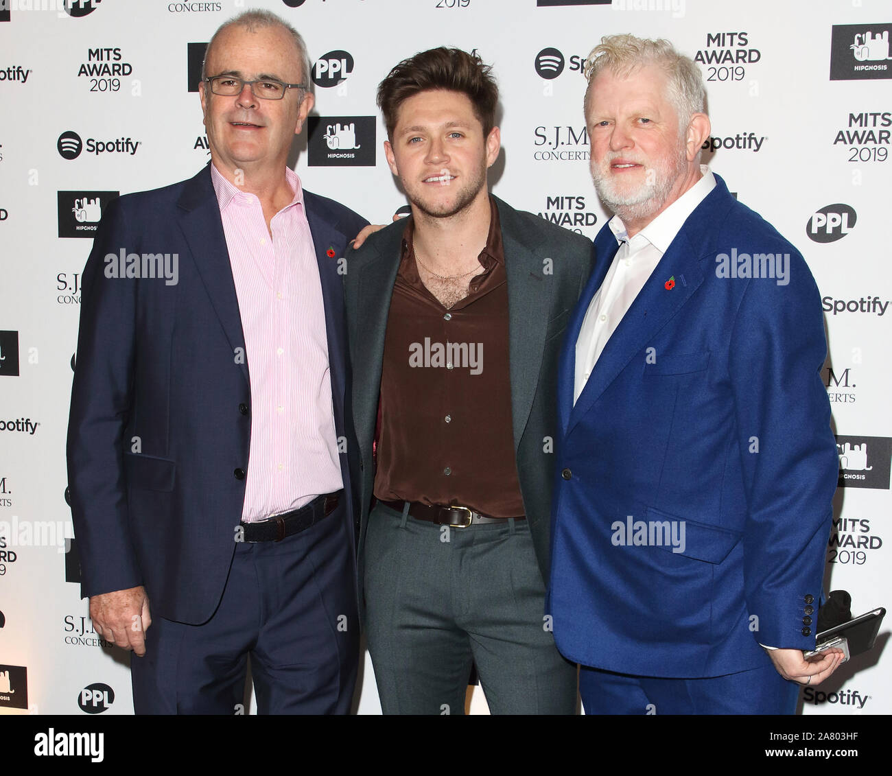 Londres, Royaume-Uni. 08Th Nov, 2019. Richard Griffiths, Niall Horan et Harry Magee assister à l'industrie de la musique compte des prix à l'hôtel Grosvenor House, Park Lane à Londres. Credit : SOPA/Alamy Images Limited Live News Banque D'Images