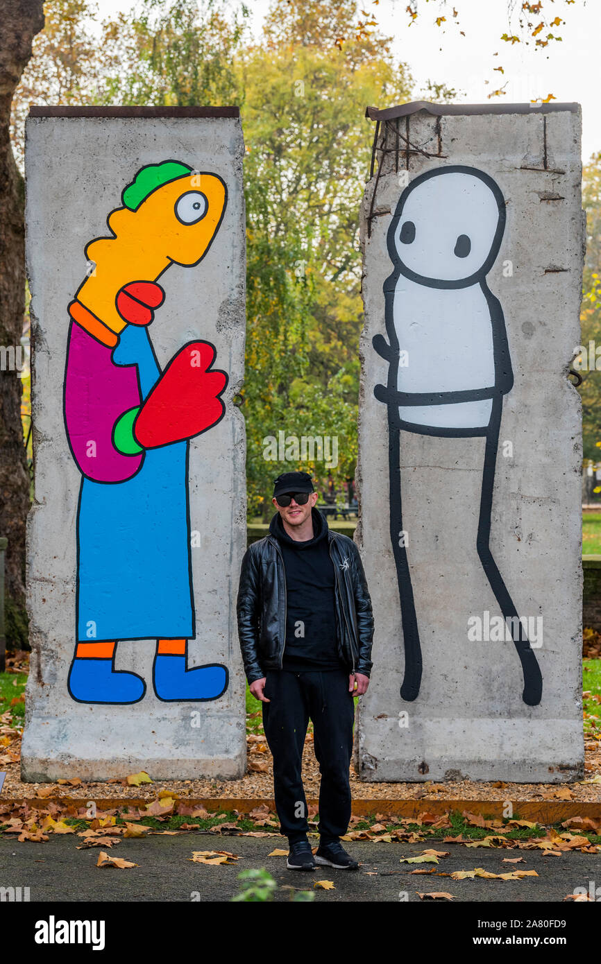 Londres, Royaume-Uni. 05Th Nov, 2019. Mur par STIK et Thierry Noir à l'IWM London - nouvelles œuvres d'artistes de rue STIK et Thierry Noir, sur l'affichage pour la première fois à l'IWM London, pour une période limitée (5 novembre- 1 décembre) pour marquer le 30e anniversaire de la chute du Mur de Berlin. Il a été créé directement sur deux thèmes originaux du mur de Berlin, récupérés à partir de Berlin en particulier pour l'installation. Crédit : Guy Bell/Alamy Live News Banque D'Images