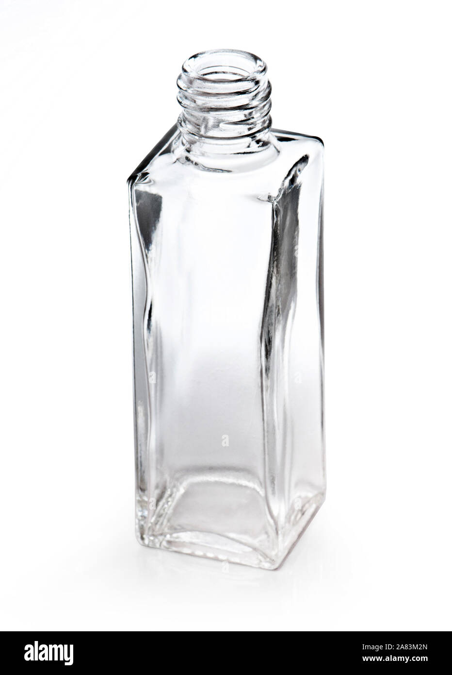 Petite bouteille en verre vide isolated on white Banque D'Images