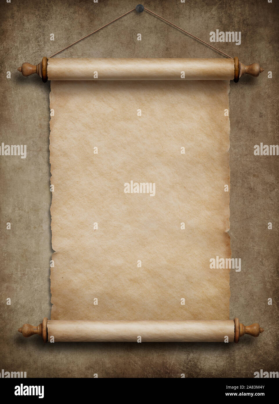 Défilement papier accroché sur vieux mur Banque D'Images
