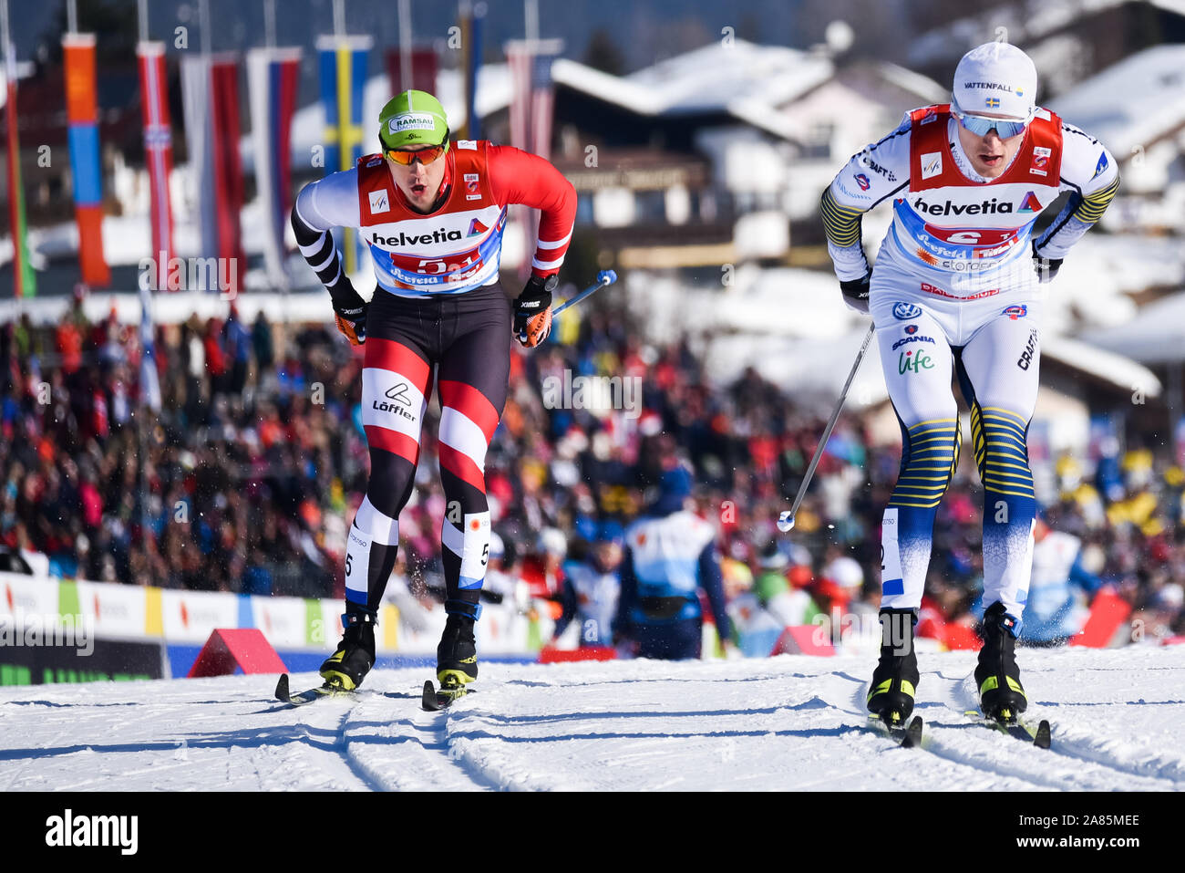 L'Autrichien Max Hauke, gauche, en sprint par équipe à la 2019 Championnats du Monde de Ski Nordique à Seefeld, Autriche. Hauke fut plus tard accusé de dopage. Banque D'Images