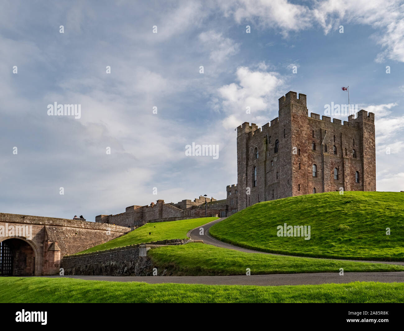 La garder au château de Bamburgh, Northumberland, Angleterre. Banque D'Images