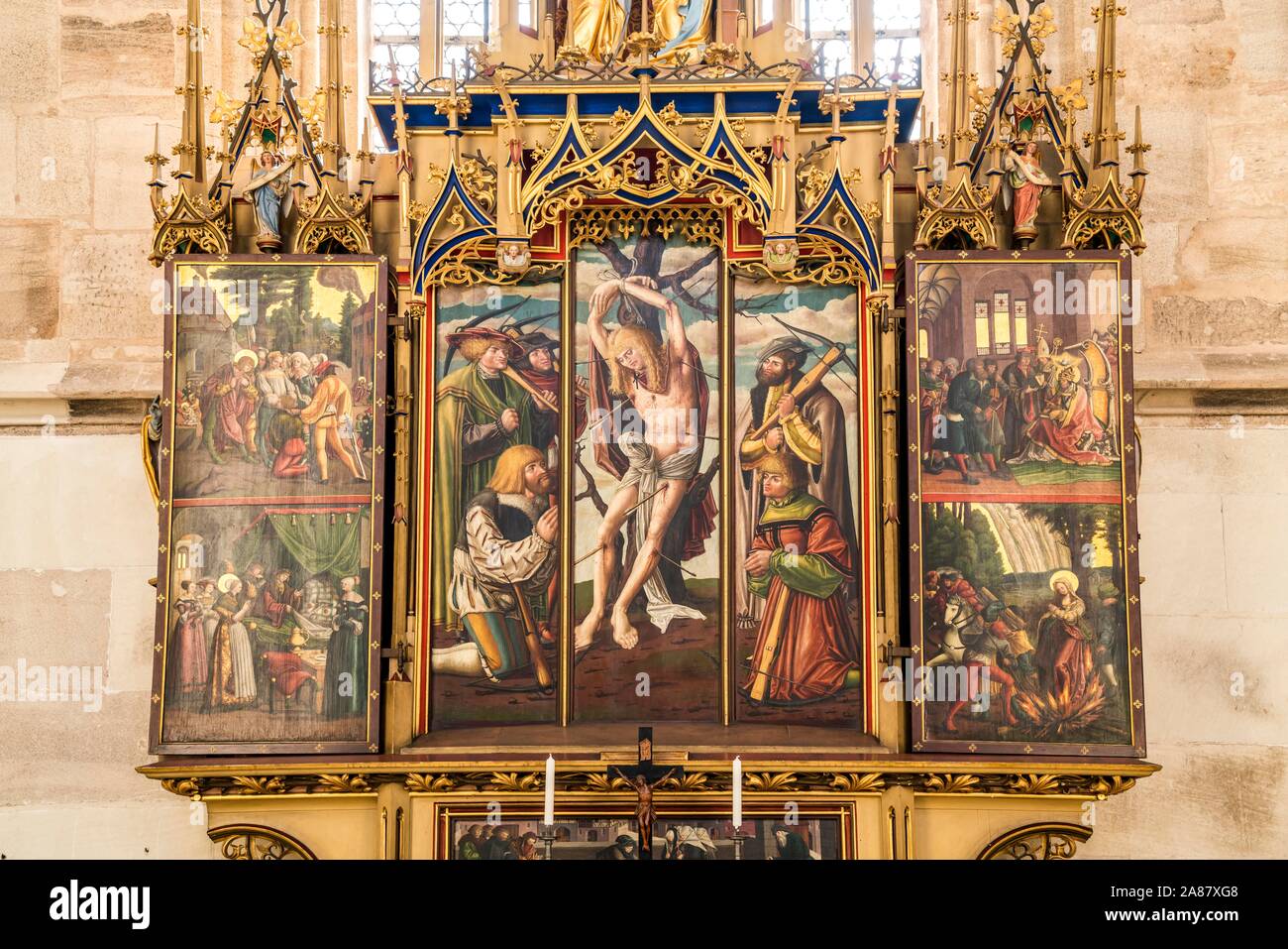 Sebastian's autel dans l'église paroissiale catholique St Georg, Dinkelsbuhl, Middle Franconia, Bavaria, Germany Banque D'Images