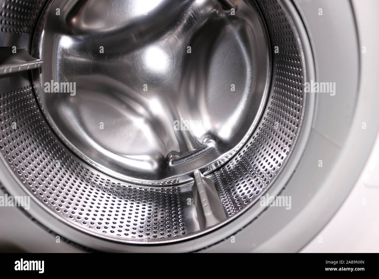 Lave-linge intérieur close up Banque D'Images