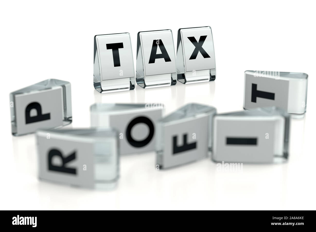 Mot d'impôt sur papier glacé et blocs écrits chuté au profit des blocs avec des lettres floues. Les impôts élevés réduisent les profits des entreprises - concept. Illustratio Banque D'Images