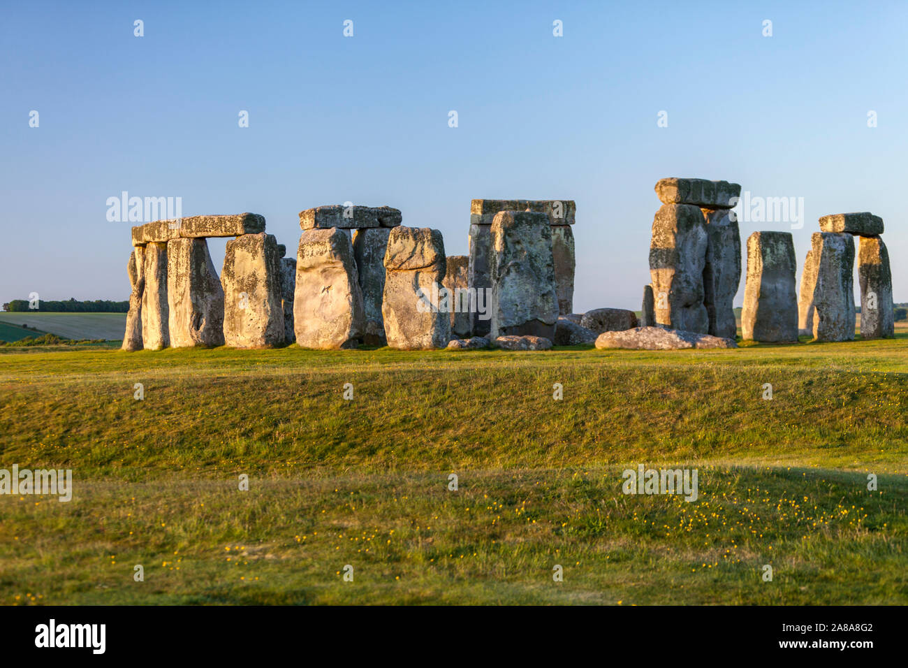 Stonehenge au coucher du soleil, un anneau de pierres, monument préhistorique, Wiltshire, England, UK Banque D'Images