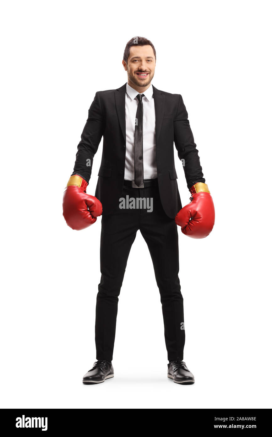 Portrait of a businessman wearing boxing gloves and smiling at the camera isolé sur fond blanc Banque D'Images