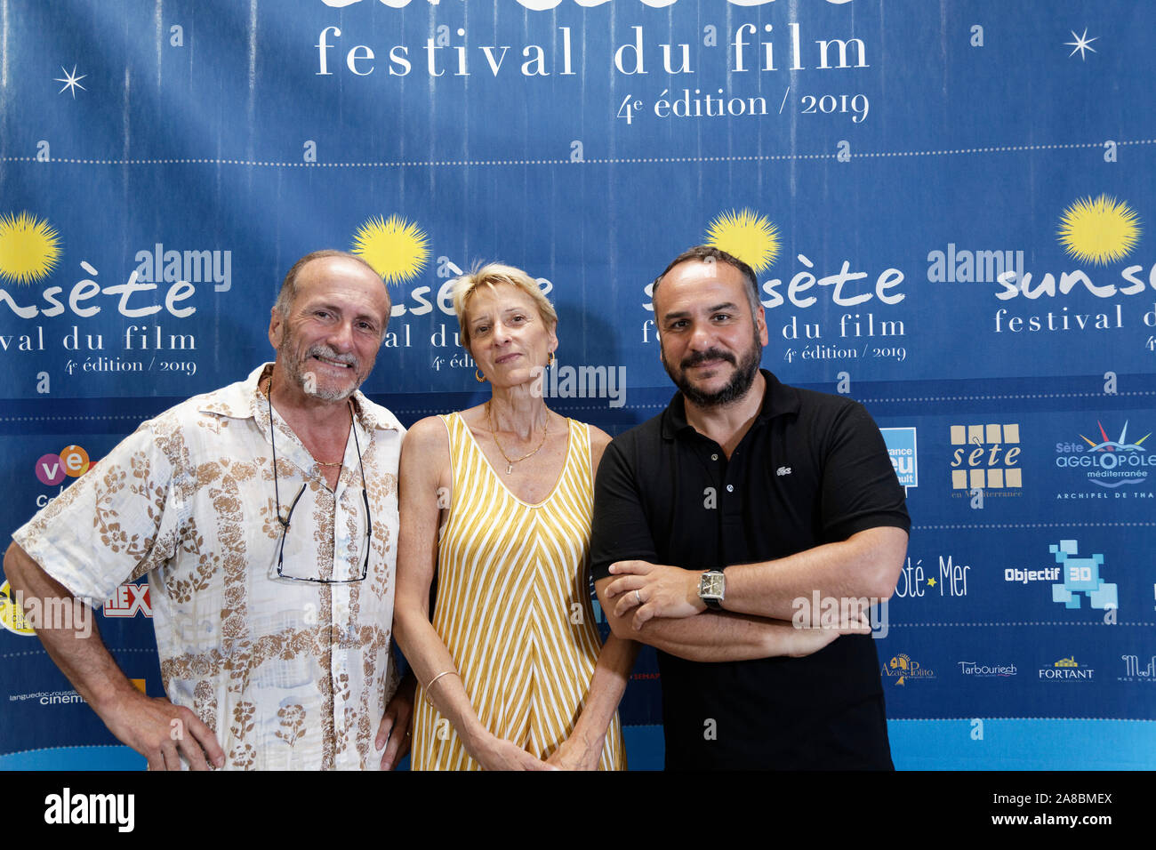 Sete, France.5 Juillet, 2019.Gerard et Jeanne Corporon et François-Xavier Demaison qui a assisté à l'inauguration d'Sunsete Festival. Banque D'Images