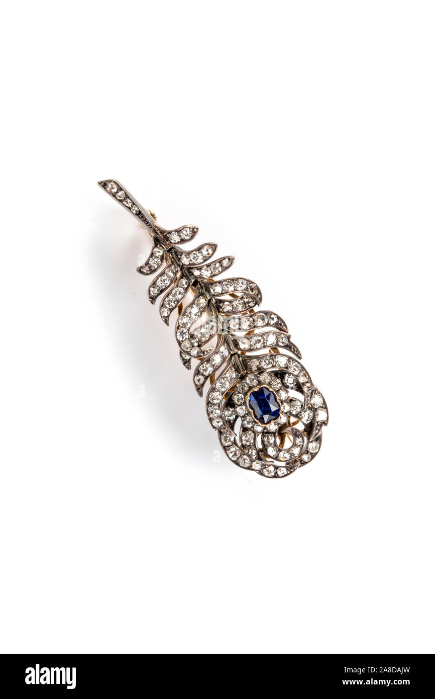 Diamant et saphir 19e siècle en tremblant, flexible, broche plume de paon. Banque D'Images