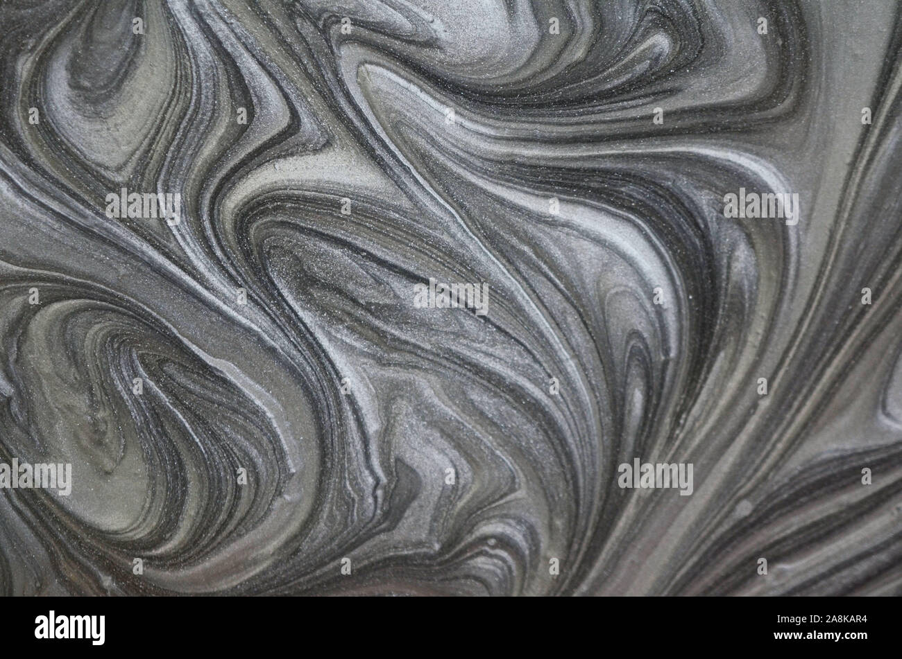 La texture de l'encre en marbre noir peint acrylique vagues texture background. Banque D'Images