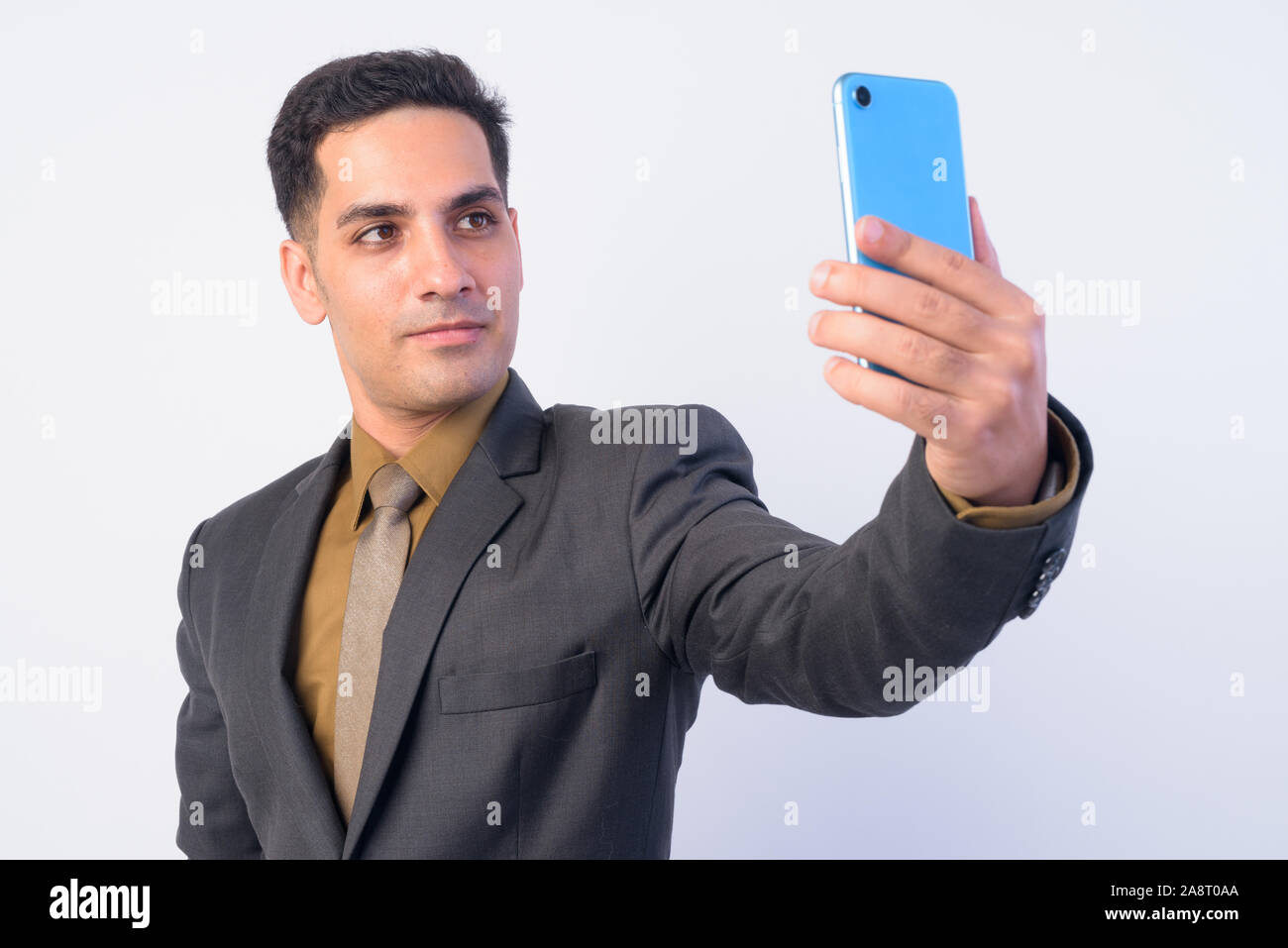 Portrait of handsome businessman persan en fonction de prendre des selfies Banque D'Images