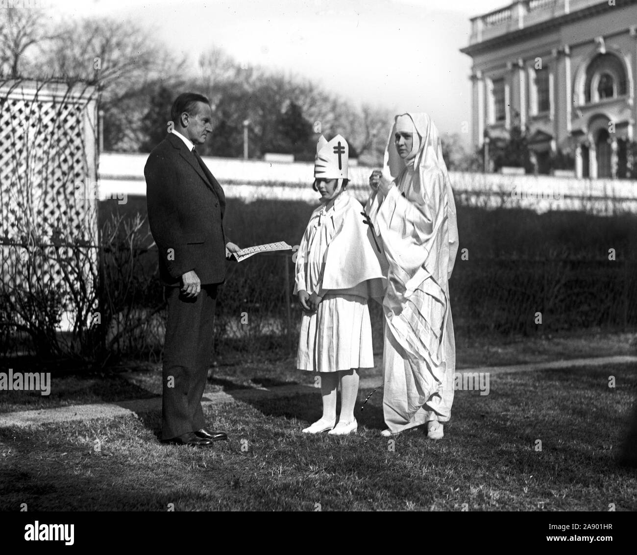 Le président Calvin Coolidge l'achat des timbres de Noël ca. 1923 Banque D'Images