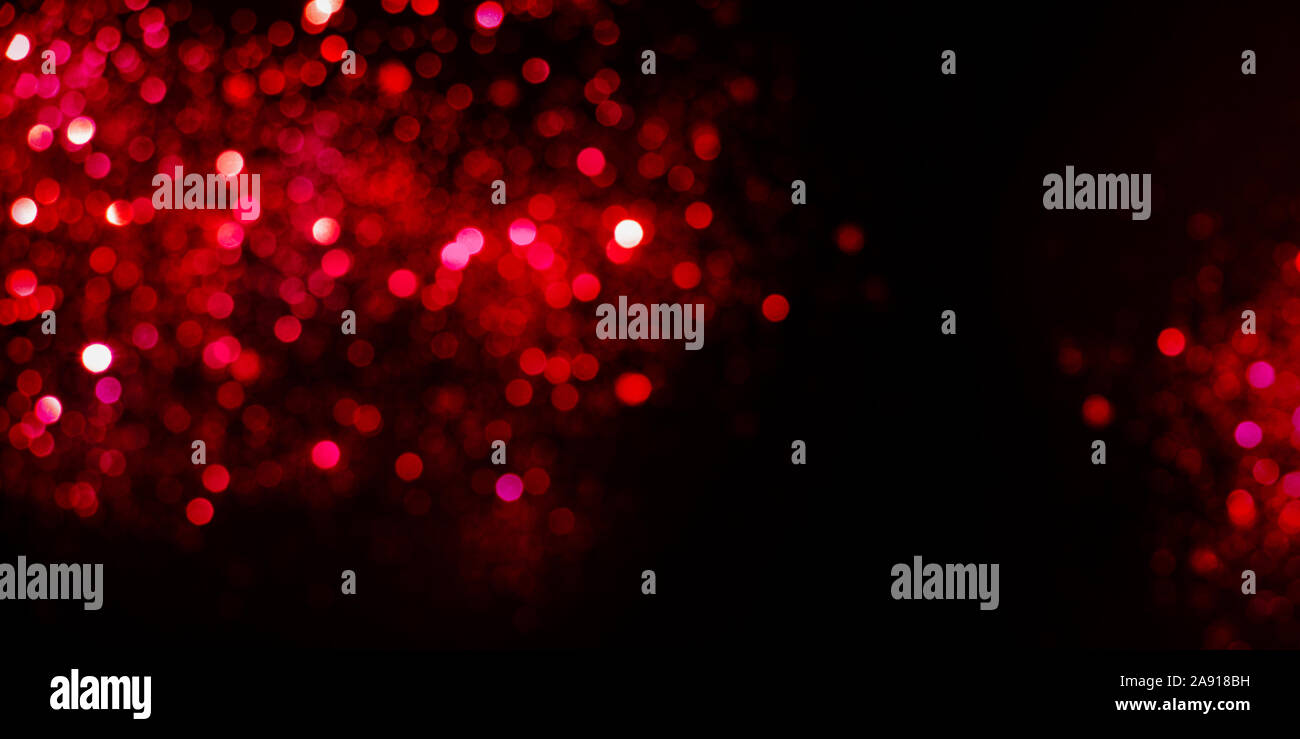 Valentines fond rouge et noir avec des lumières scintillantes bokeh. Copy space Banque D'Images