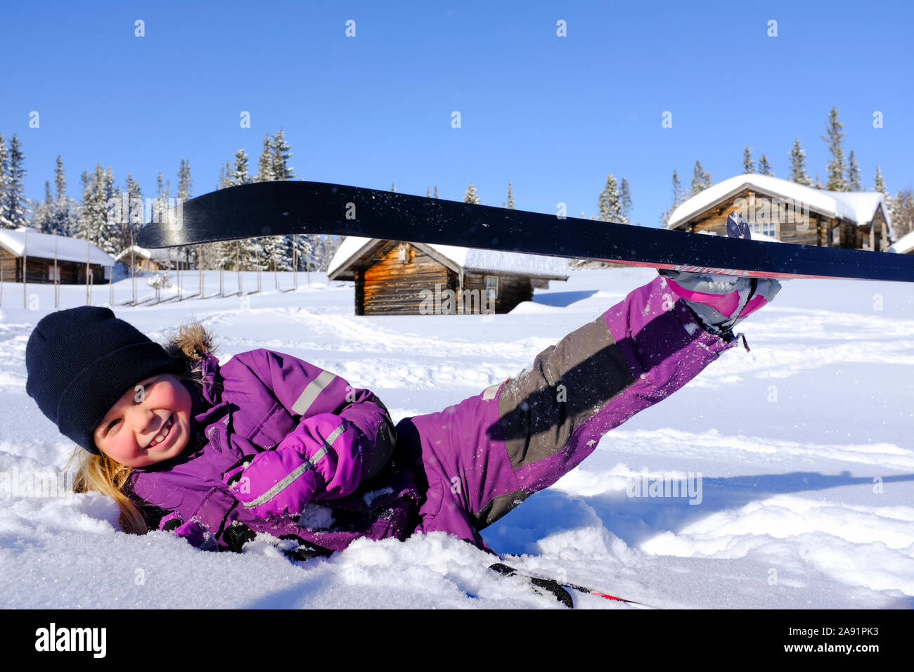 Happy girl sur la neige Banque D'Images