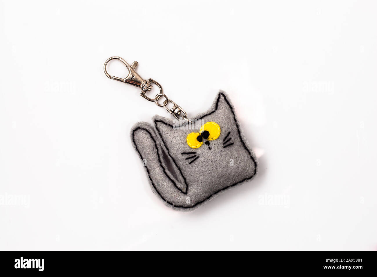 Trousseau estimé en forme chaton. Bijoux faits main. Banque D'Images