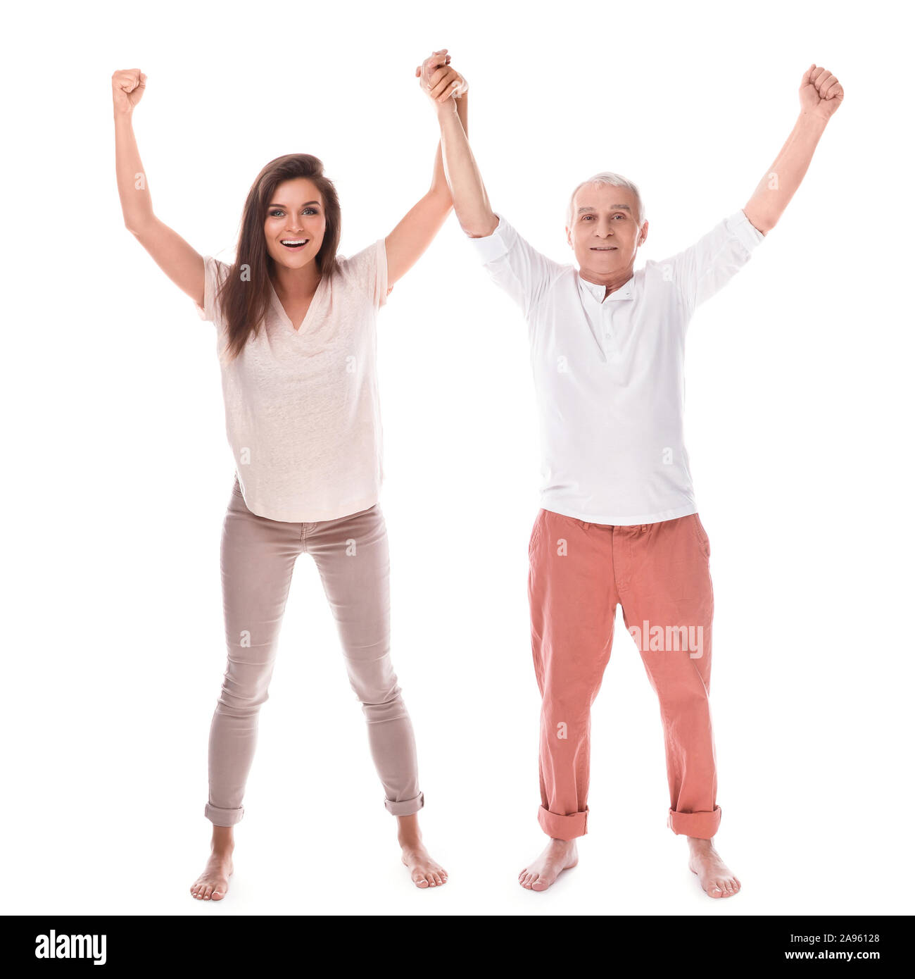 Jeune femme heureuse et son vieux père sur fond blanc Banque D'Images