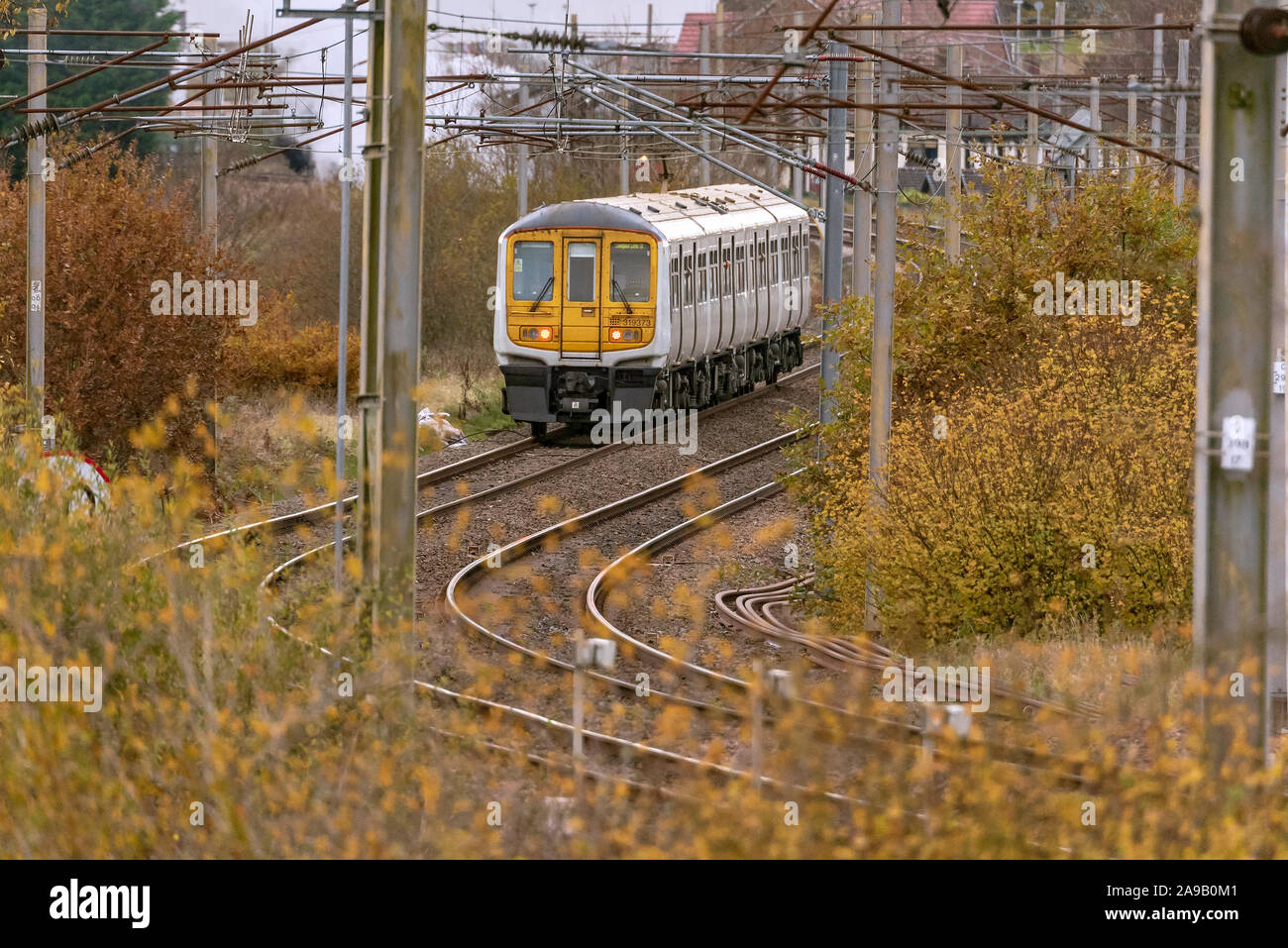 British Rail Class 319 est un double-tension électrique train à Winwick junction. Banque D'Images