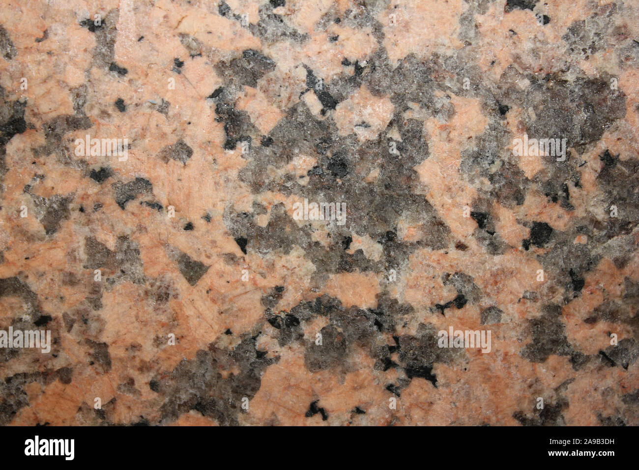 De Granit rouge - un type de granite riche en minéraux le feldspath potassique (k-spar) Banque D'Images
