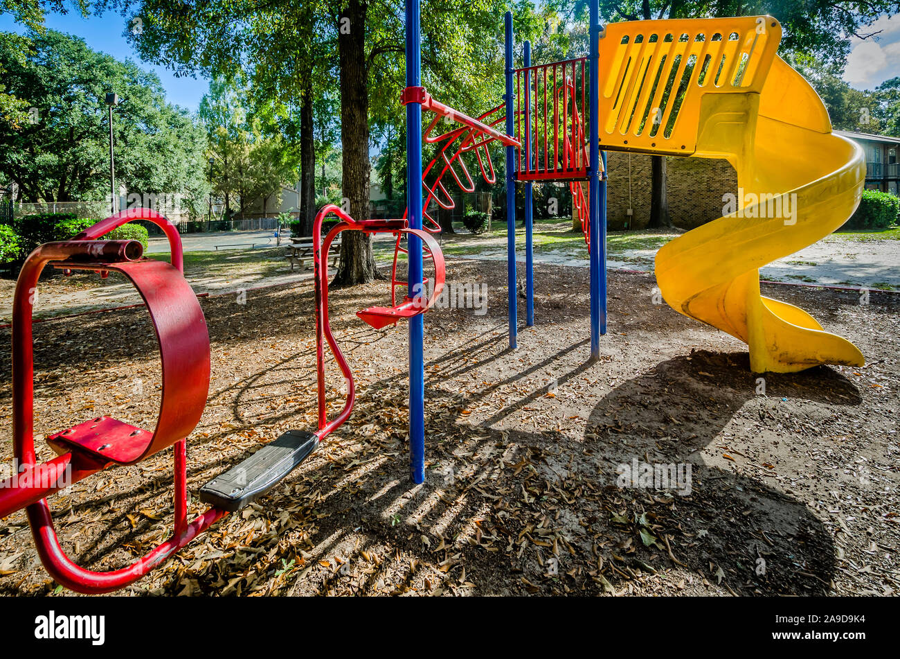Une aire de jeux est l'un des équipements disponibles pour les résidents de maisons de vacances Bois d'automne dans la région de Mobile, Alabama. Banque D'Images