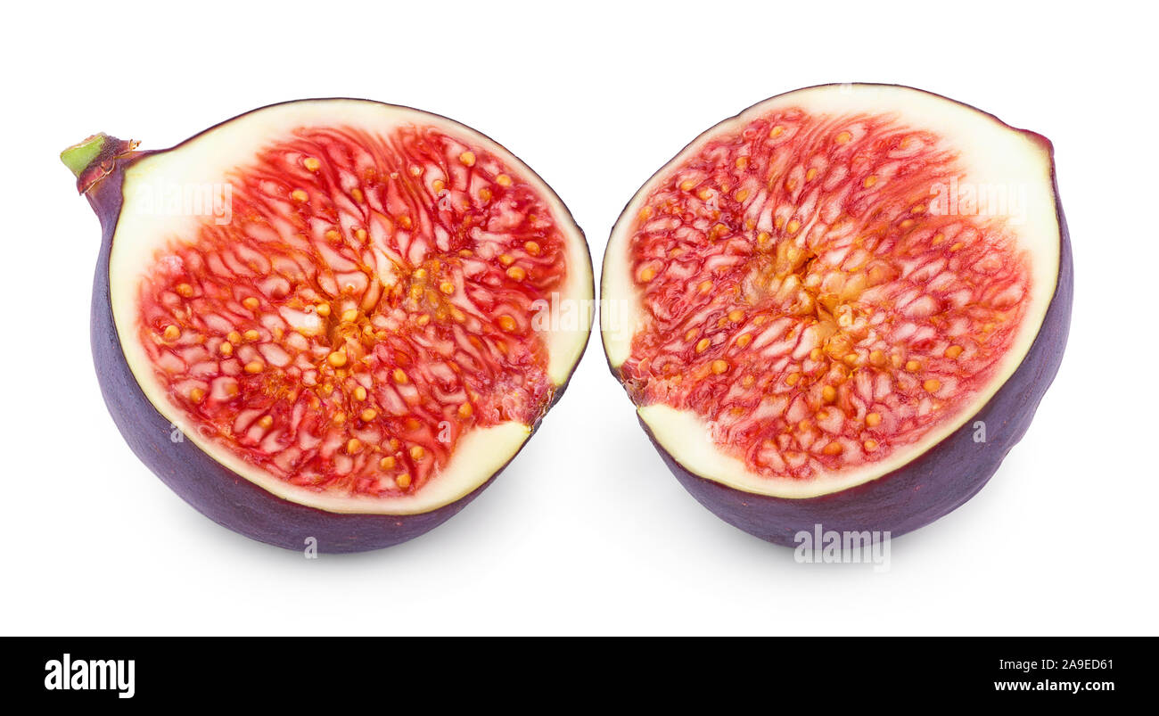 Fruits frais fig la moitié isolé sur fond blanc Banque D'Images