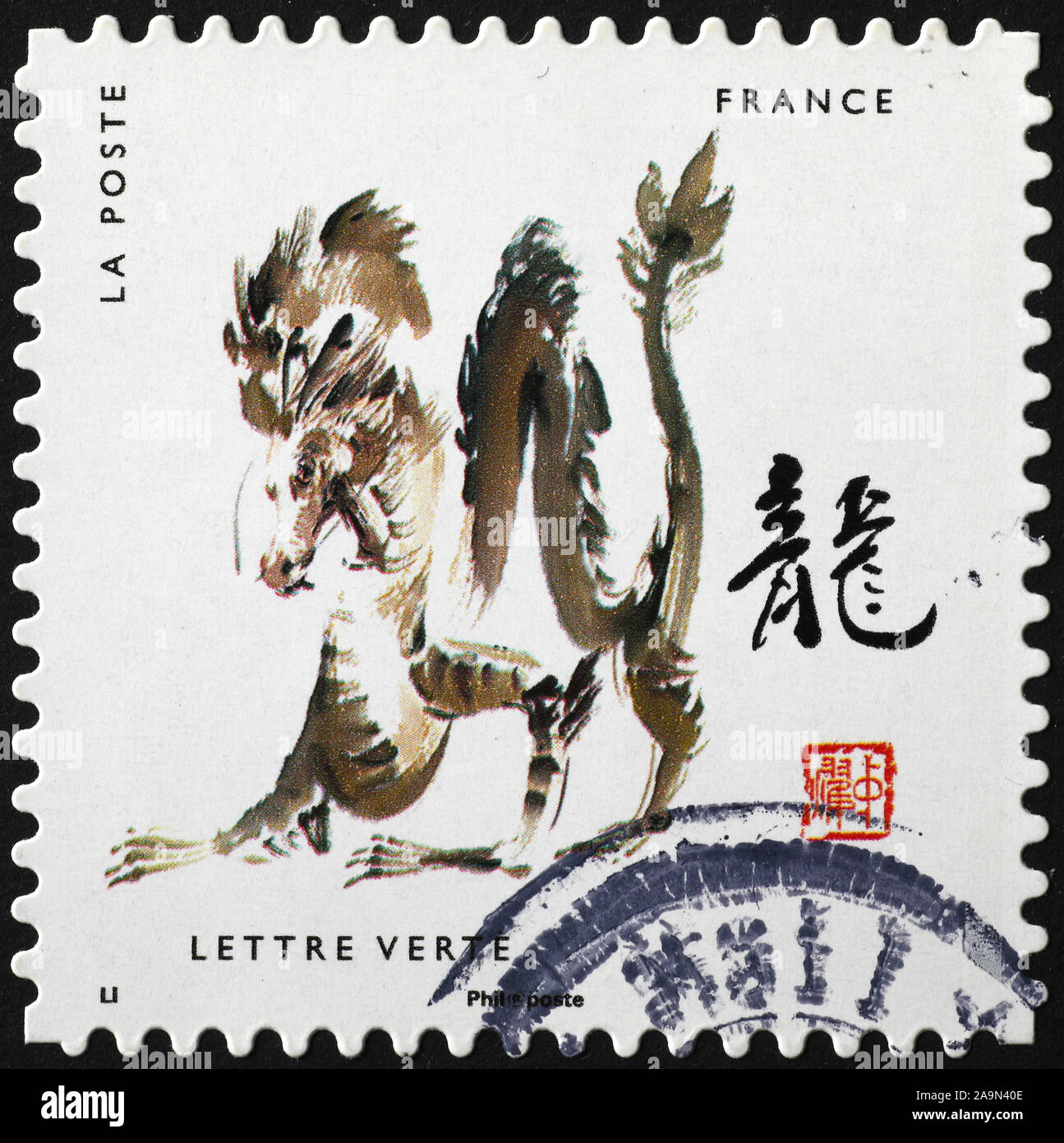 Peinture de la dragon de zodiaque chinois sur timbre-poste Banque D'Images