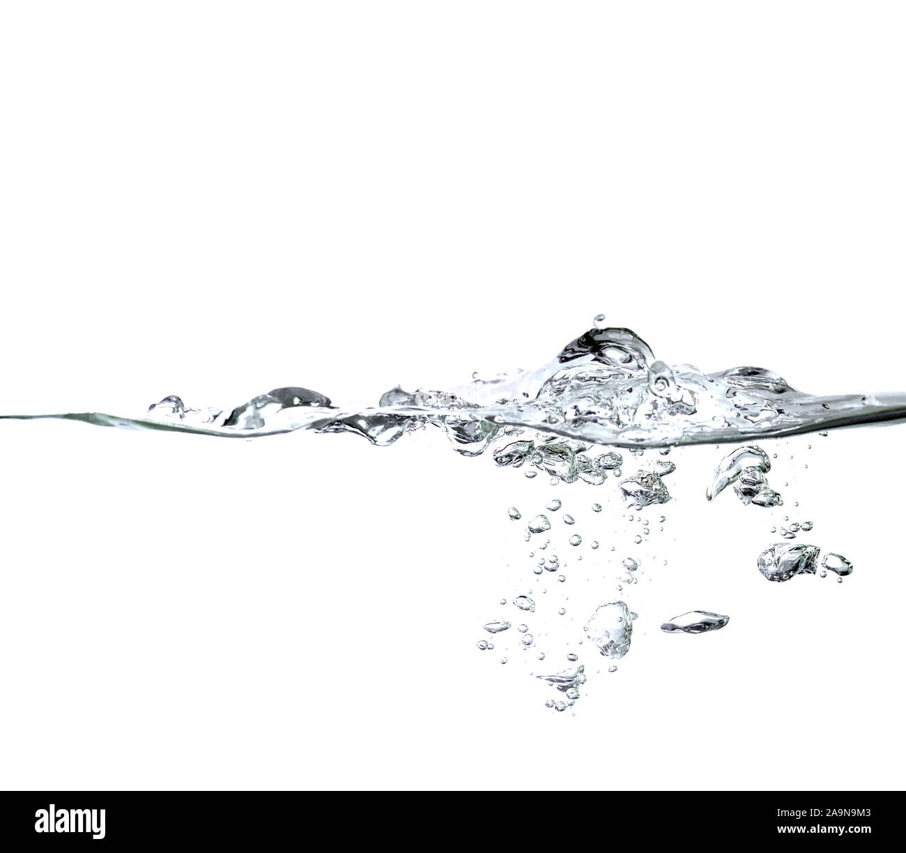 Les éclaboussures d'eau et d'abandon sur fond blanc Banque D'Images