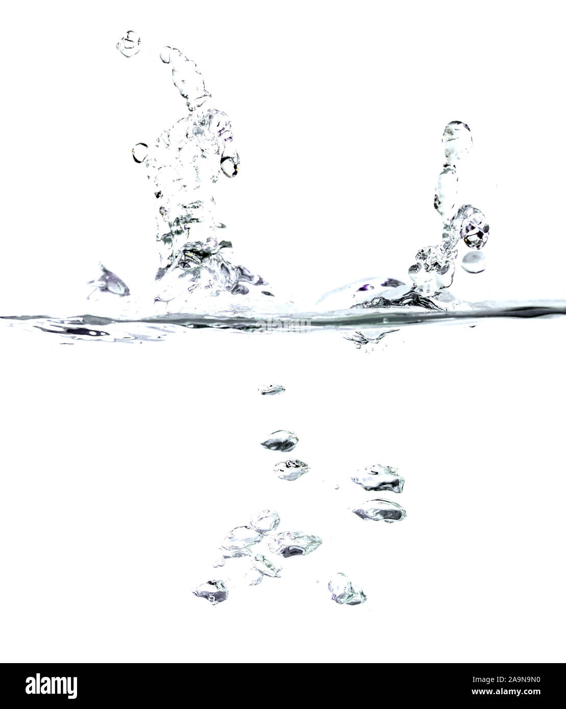 Les éclaboussures d'eau et d'abandon sur fond blanc Banque D'Images