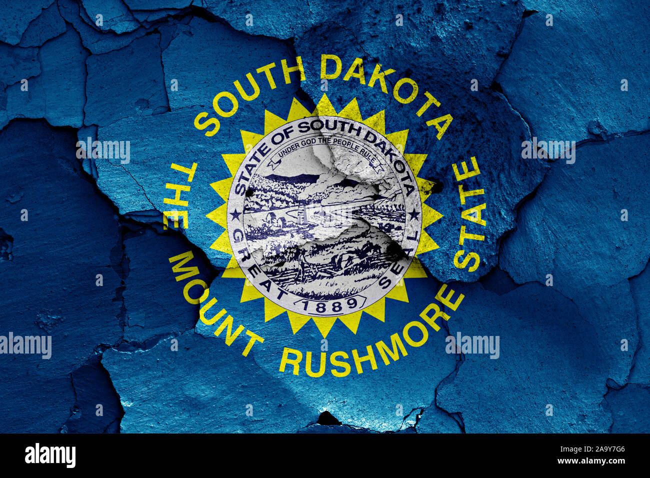 Du Dakota du Sud drapeau peint sur mur fissuré Banque D'Images