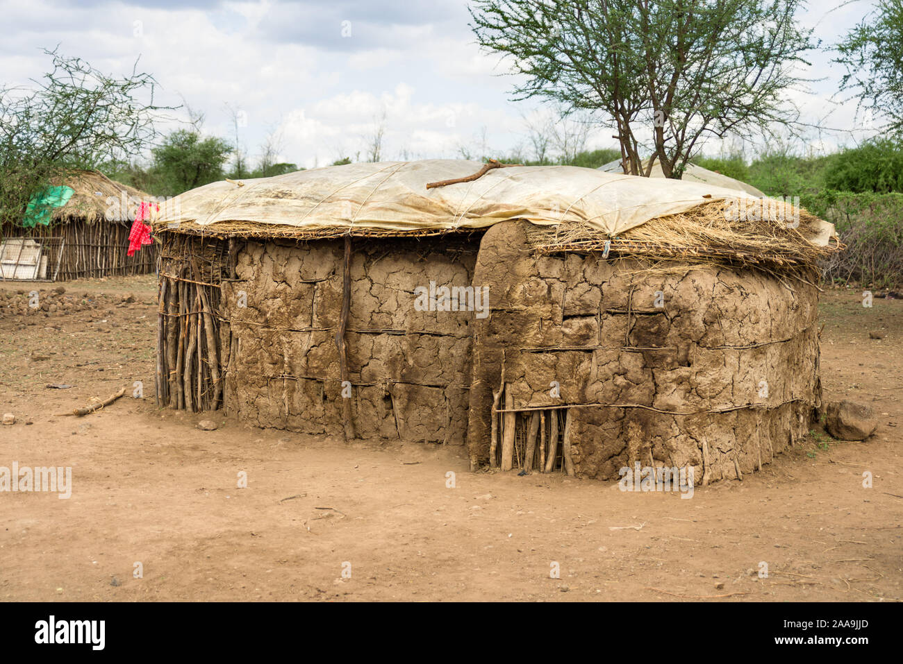 Un traditionnel Masai Masai ou cabane de torchis, faites de branches, de bouse de vache et de boue, au Kenya Banque D'Images