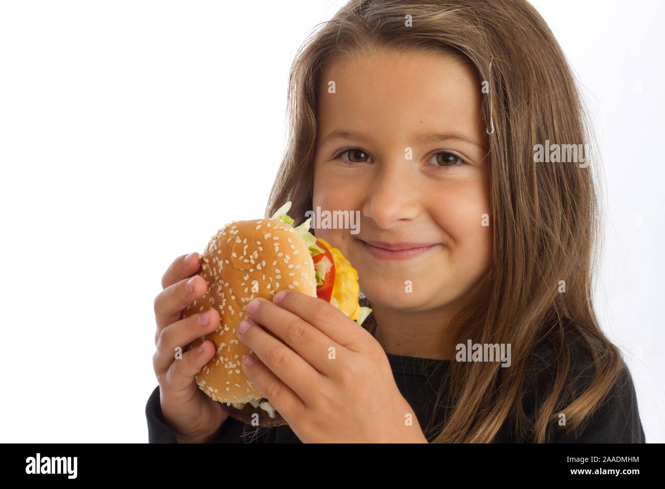 Mädchen hält Hamburger (Mr) Banque D'Images
