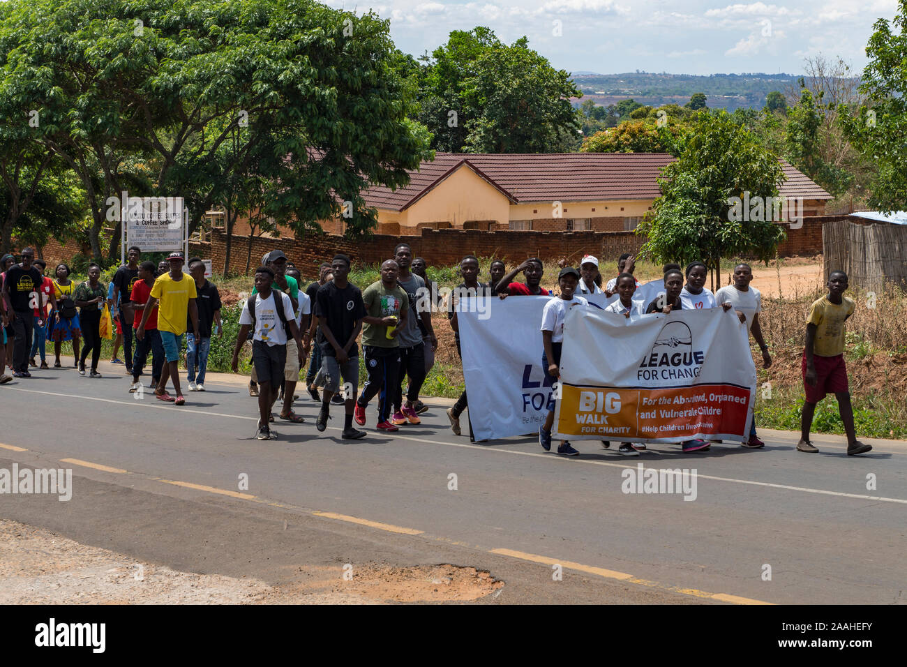 La charité à pied pour la Ligue pour le changement à Lilongwe, Malawi Banque D'Images